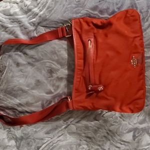 Small red coach bag